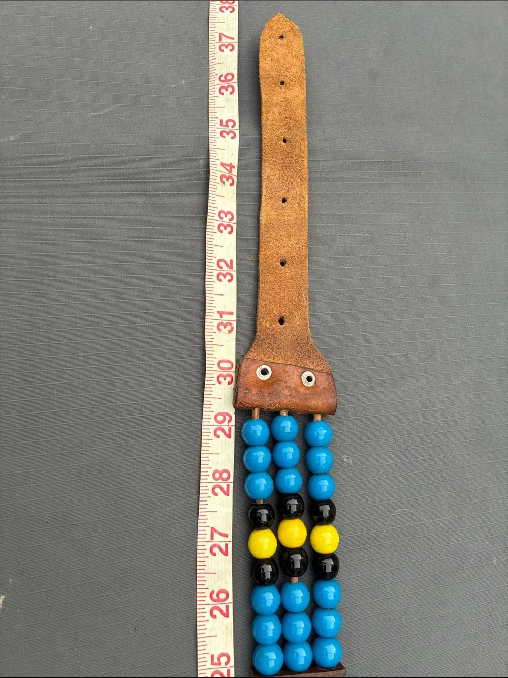 Vintage leather beaded belt. Source unknown. Nice handmade accessory